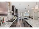 43 Evansglen Circle Nw, Calgary, AB  - Indoor Photo Showing Kitchen With Double Sink With Upgraded Kitchen 