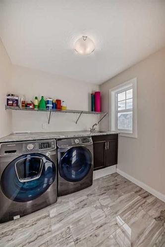 43 Evansglen Circle Nw, Calgary, AB - Indoor Photo Showing Laundry Room