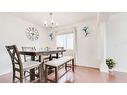 110 Taravista Drive Ne, Calgary, AB  - Indoor Photo Showing Dining Room 