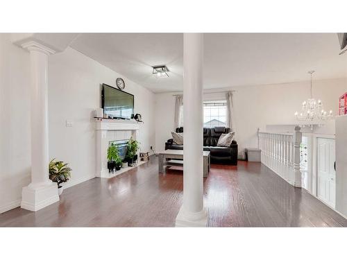 110 Taravista Drive Ne, Calgary, AB - Indoor With Fireplace