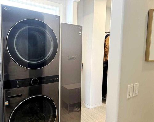 26 Elgin Park Road Se, Calgary, AB - Indoor Photo Showing Laundry Room