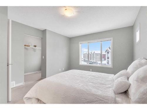 214 Copperpond Row Se, Calgary, AB - Indoor Photo Showing Bedroom