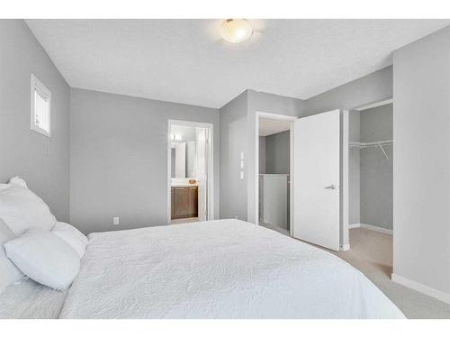 214 Copperpond Row Se, Calgary, AB - Indoor Photo Showing Bedroom