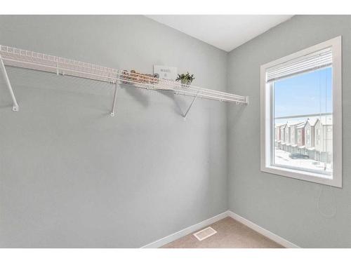 214 Copperpond Row Se, Calgary, AB - Indoor With Storage