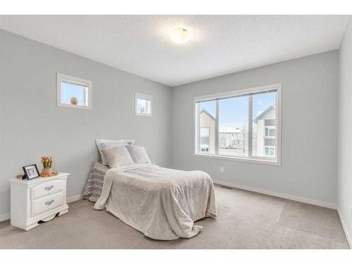 214 Copperpond Row Se, Calgary, AB - Indoor Photo Showing Bedroom