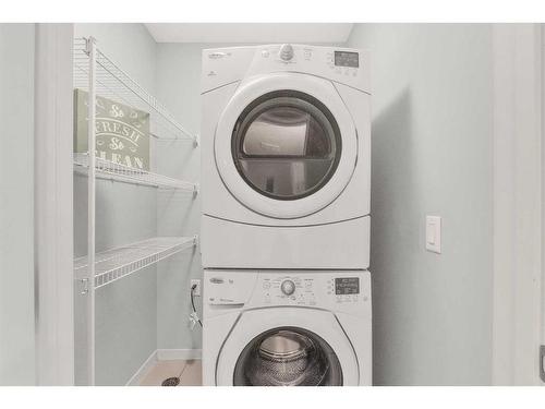 214 Copperpond Row Se, Calgary, AB - Indoor Photo Showing Laundry Room