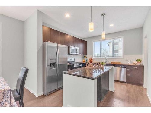 214 Copperpond Row Se, Calgary, AB - Indoor Photo Showing Kitchen With Stainless Steel Kitchen With Upgraded Kitchen