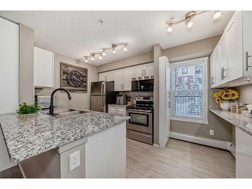 2140-81 Legacy Boulevard Se, Calgary, AB - Indoor Photo Showing Kitchen With Double Sink With Upgraded Kitchen