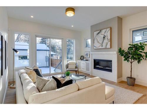 1635 Bowness Road Nw, Calgary, AB - Indoor Photo Showing Living Room With Fireplace