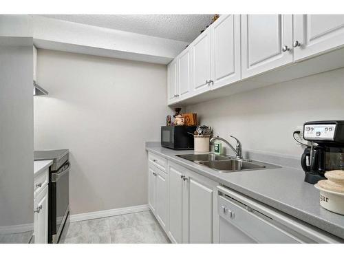 2217-6224 17 Avenue Se, Calgary, AB - Indoor Photo Showing Kitchen With Double Sink