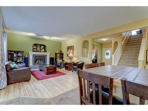 304 Oakmere Way, Chestermere, AB - Indoor With Fireplace