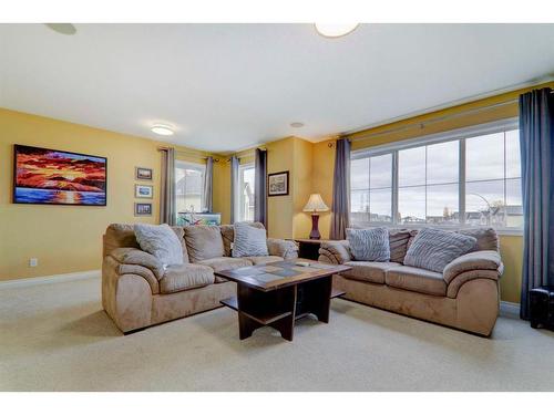 304 Oakmere Way, Chestermere, AB - Indoor Photo Showing Living Room