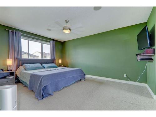 304 Oakmere Way, Chestermere, AB - Indoor Photo Showing Bedroom