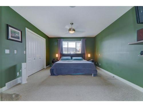 304 Oakmere Way, Chestermere, AB - Indoor Photo Showing Bedroom