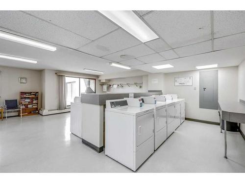 711-924 14 Avenue Sw, Calgary, AB - Indoor Photo Showing Laundry Room