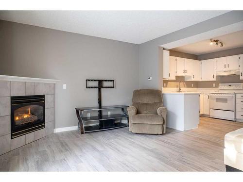 27 Somervale Park Sw, Calgary, AB - Indoor With Fireplace