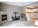 27 Somervale Park Sw, Calgary, AB  - Indoor With Fireplace 