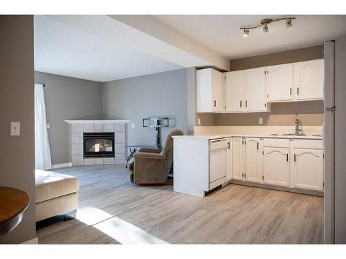 27 Somervale Park Sw, Calgary, AB - Indoor With Fireplace