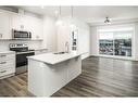 421-40 Walgrove Se, Calgary, AB  - Indoor Photo Showing Kitchen With Stainless Steel Kitchen With Double Sink With Upgraded Kitchen 