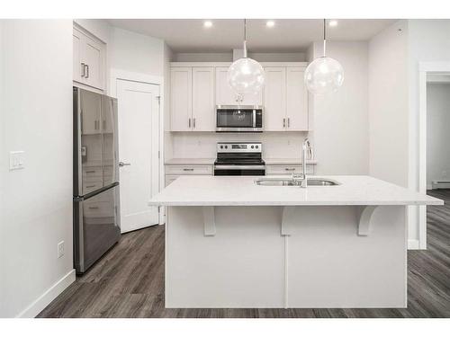 421-40 Walgrove Se, Calgary, AB - Indoor Photo Showing Kitchen With Stainless Steel Kitchen With Double Sink With Upgraded Kitchen