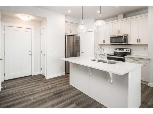 421-40 Walgrove Se, Calgary, AB - Indoor Photo Showing Kitchen With Stainless Steel Kitchen With Double Sink With Upgraded Kitchen