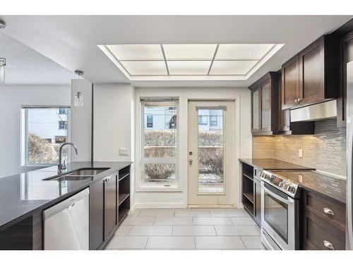 110-114 15 Avenue Sw, Calgary, AB - Indoor Photo Showing Kitchen With Stainless Steel Kitchen With Double Sink With Upgraded Kitchen