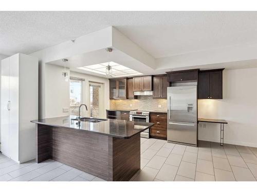 110-114 15 Avenue Sw, Calgary, AB - Indoor Photo Showing Kitchen With Stainless Steel Kitchen