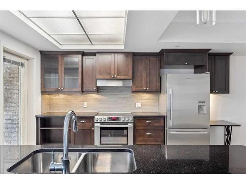 110-114 15 Avenue Sw, Calgary, AB - Indoor Photo Showing Kitchen With Stainless Steel Kitchen With Double Sink With Upgraded Kitchen