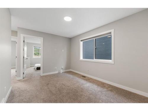 283 Wolf Creek Way Se, Calgary, AB - Indoor Photo Showing Other Room