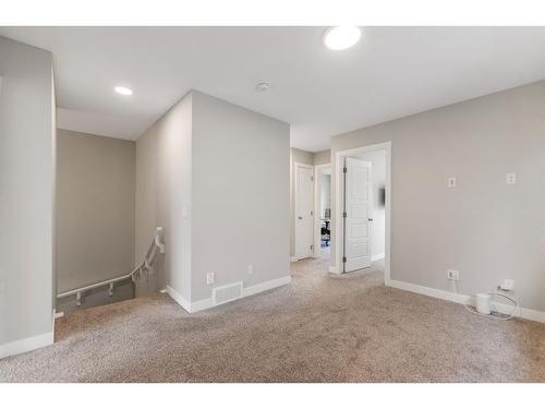 283 Wolf Creek Way Se, Calgary, AB - Indoor Photo Showing Other Room