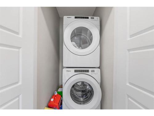 283 Wolf Creek Way Se, Calgary, AB - Indoor Photo Showing Laundry Room