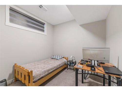 283 Wolf Creek Way Se, Calgary, AB - Indoor Photo Showing Bedroom