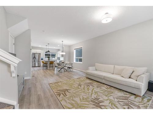 283 Wolf Creek Way Se, Calgary, AB - Indoor Photo Showing Living Room