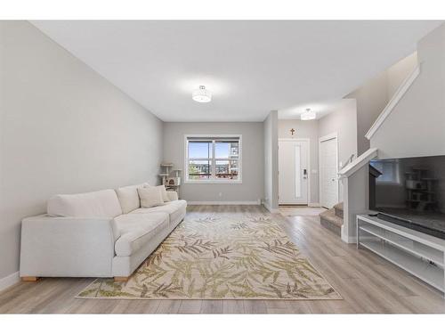 283 Wolf Creek Way Se, Calgary, AB - Indoor Photo Showing Living Room