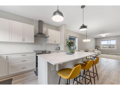 283 Wolf Creek Way Se, Calgary, AB - Indoor Photo Showing Kitchen With Upgraded Kitchen