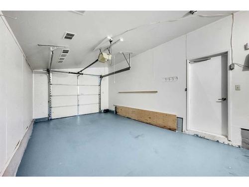 310 Wascana Crescent Se, Calgary, AB - Indoor Photo Showing Garage