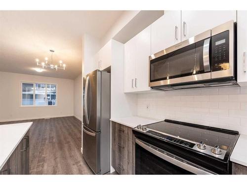 418-137 Red Embers Link Ne, Calgary, AB - Indoor Photo Showing Kitchen With Stainless Steel Kitchen