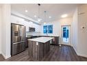 418-137 Red Embers Link Ne, Calgary, AB  - Indoor Photo Showing Kitchen With Stainless Steel Kitchen With Upgraded Kitchen 