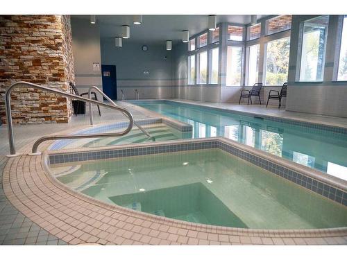 89 Hawkside Road Nw, Calgary, AB - Indoor Photo Showing Other Room With In Ground Pool