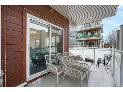 102-360 Harvest Hills Common Ne, Calgary, AB - Outdoor With Balcony With Exterior