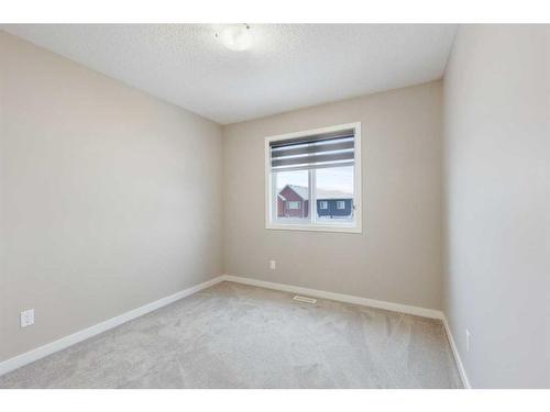 221 Seton Circle Se, Calgary, AB - Indoor Photo Showing Other Room