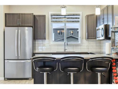 221 Seton Circle Se, Calgary, AB - Indoor Photo Showing Kitchen With Stainless Steel Kitchen