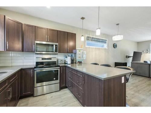 221 Seton Circle Se, Calgary, AB - Indoor Photo Showing Kitchen