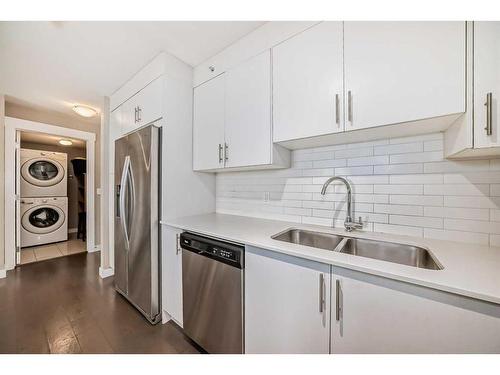 1406-302 Skyview Ranch Drive Ne, Calgary, AB - Indoor Photo Showing Kitchen With Stainless Steel Kitchen With Double Sink