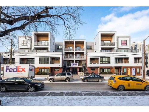 112-120 18 Avenue Sw, Calgary, AB - Outdoor With Facade