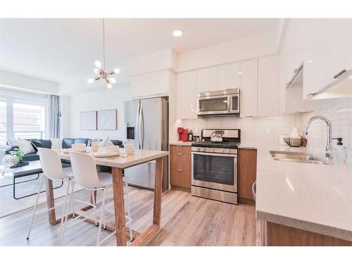 112-120 18 Avenue Sw, Calgary, AB - Indoor Photo Showing Kitchen With Upgraded Kitchen