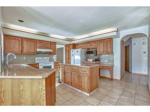 296 Edgebank Circle Nw, Calgary, AB - Indoor Photo Showing Kitchen With Double Sink