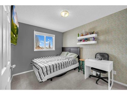 46 Copperfield Terrace Se, Calgary, AB - Indoor Photo Showing Bedroom