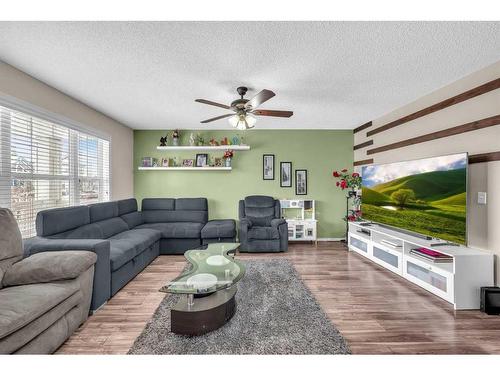 46 Copperfield Terrace Se, Calgary, AB - Indoor Photo Showing Living Room