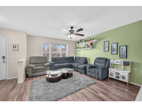 46 Copperfield Terrace Se, Calgary, AB - Indoor Photo Showing Living Room